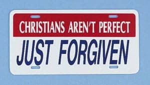 License plate that reads "Christians arent' perfect, just forgiven"