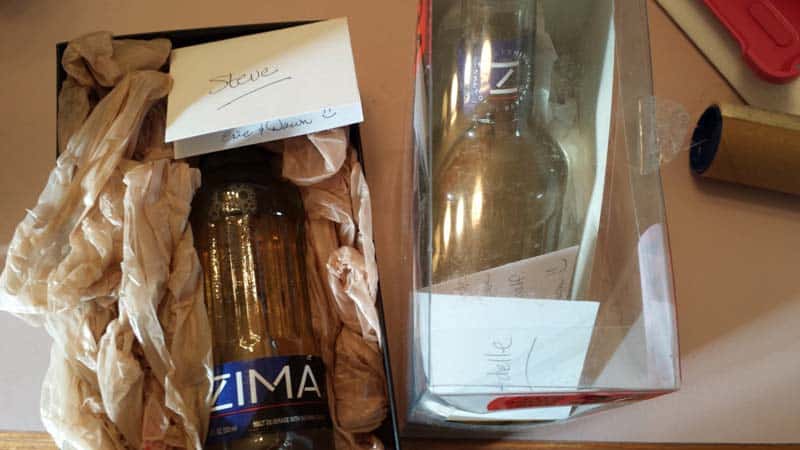 Image of two Zima bottles packaged in gift boxes, to be delivered